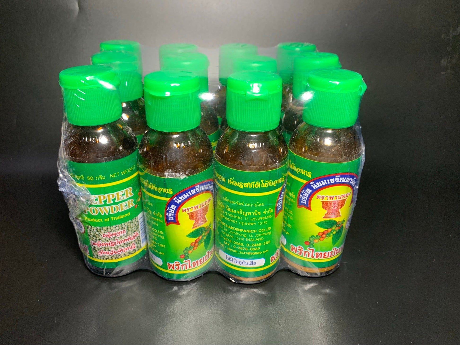 พริกไทยป่นขวด 1 แพ็ค 12 ขวด ขวดแก้ว ตราพานทอง Pepper powder 1 pack 12 pcs glass. - Niyomherb