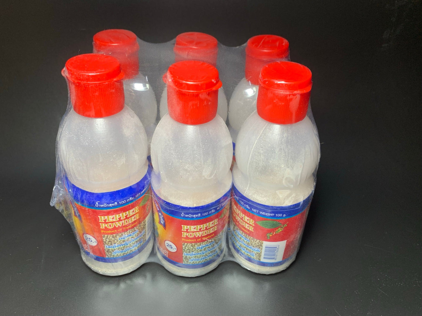 พริกไทยป่นขวด 1 แพ็ค 6 ขวด ขวดพลาสติก ตราพานทอง Pepper powder 1 pack 6 pcs plastic. - Niyomherb
